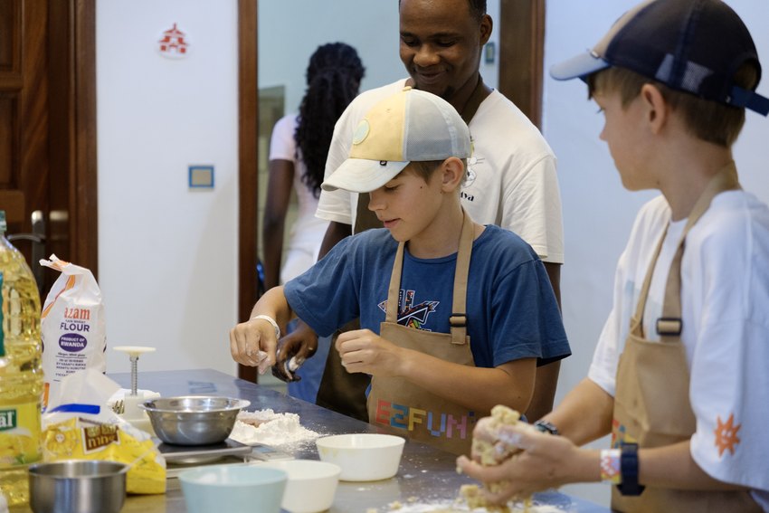 Children prepare ingredients at the traditional food workshop